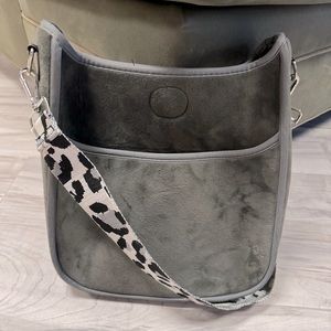 Ahdorned crossbody bag. Velvet grey with crossbody strap.